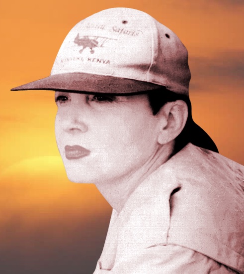 A black-and-white photo of author Susan St. John, on a sepia-toned backdrop. She's wearing a t-shirt and a baseball cap, gazing into the distance.